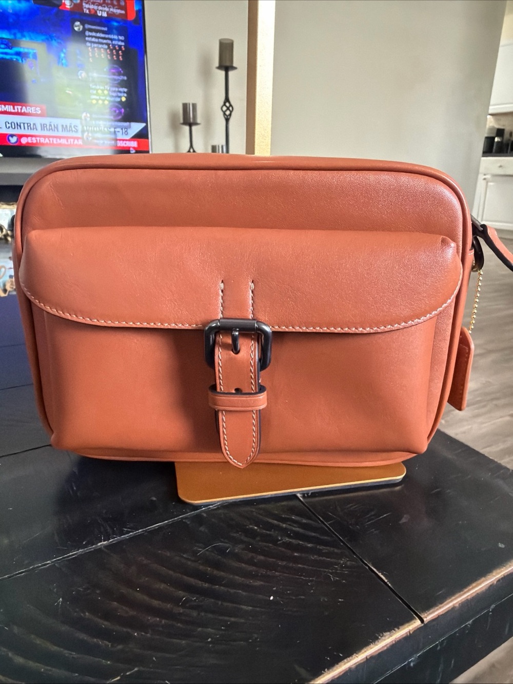 Coach Warner crossbody bag in Saddle Brown leather with gunmetal hardware